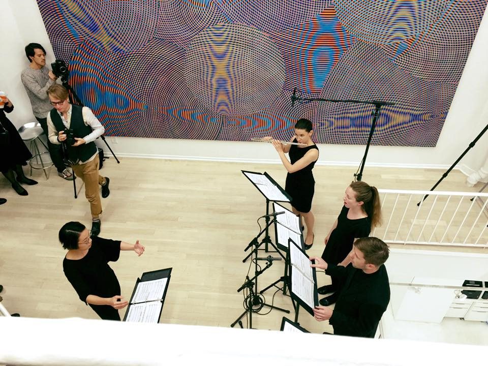 Contemporary music performance with flute and vocalists