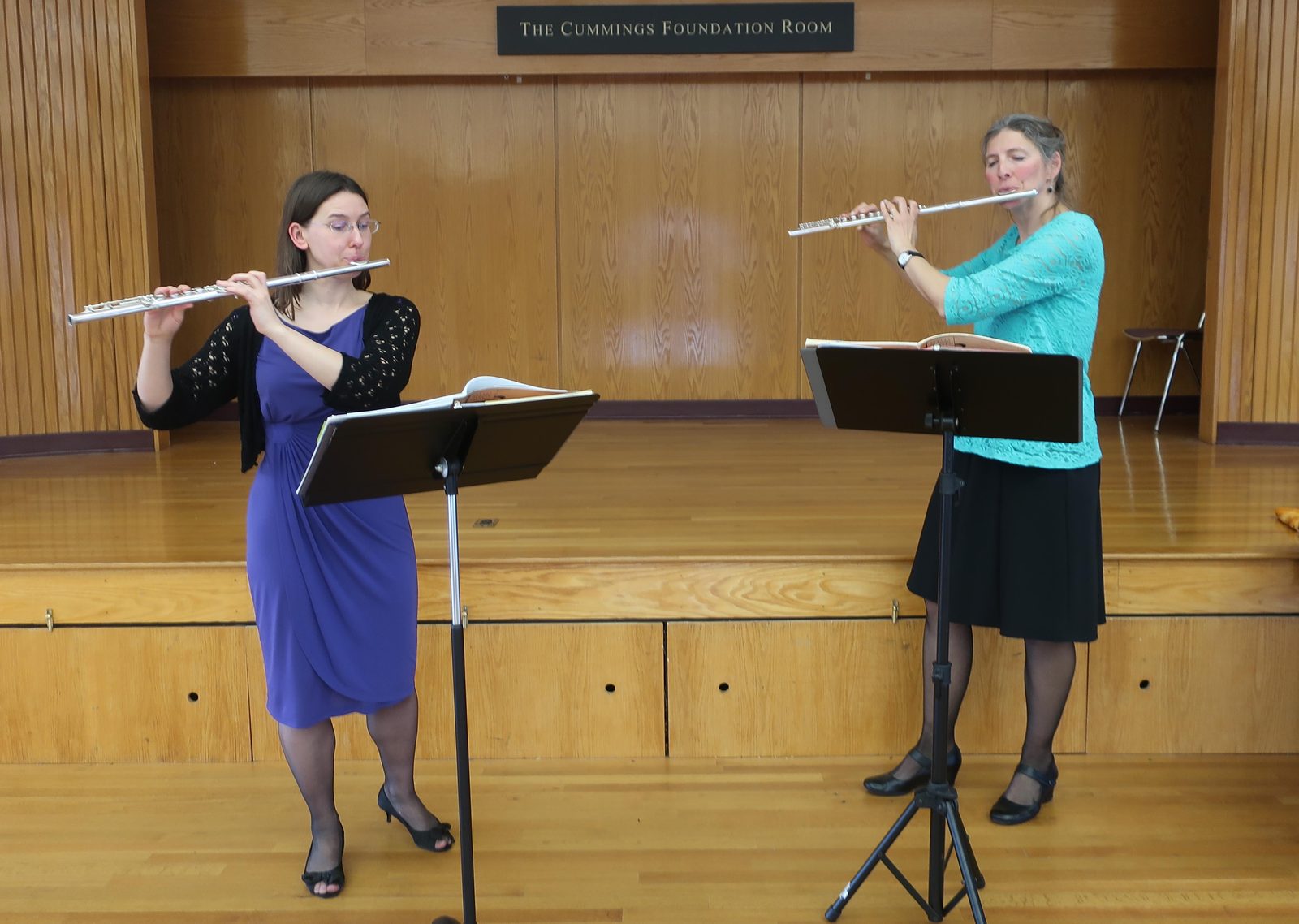 Two flutists playing chamber music